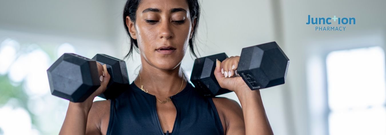 Woman lifting weights to support weight management treatment