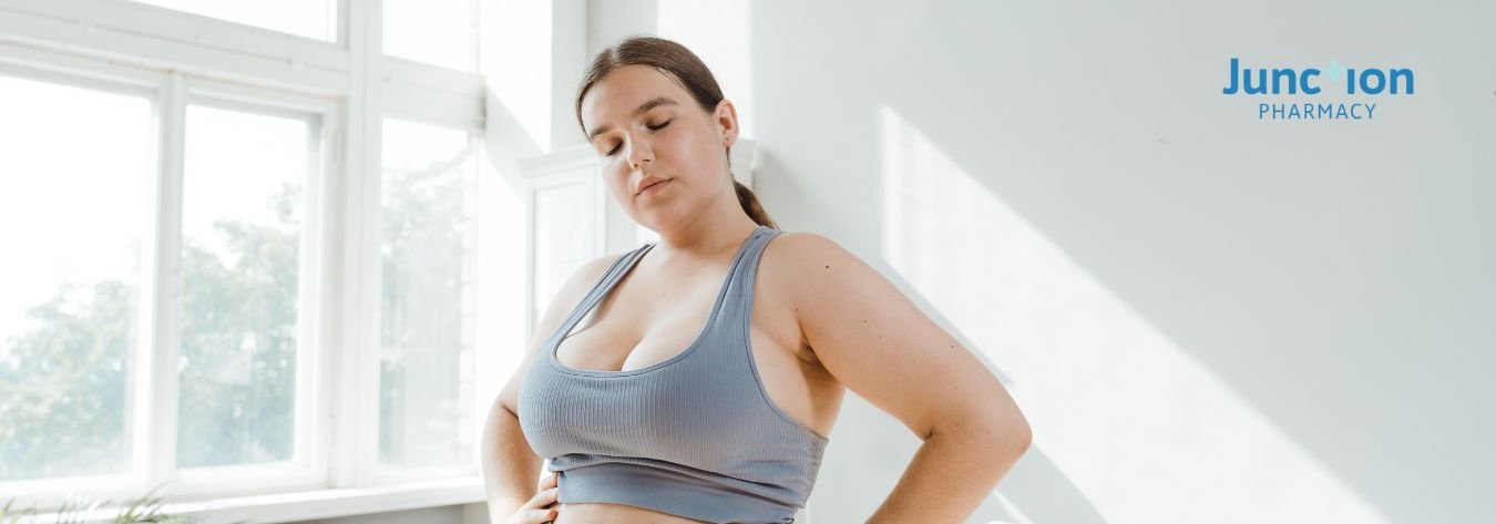 Overweight woman in gym wear