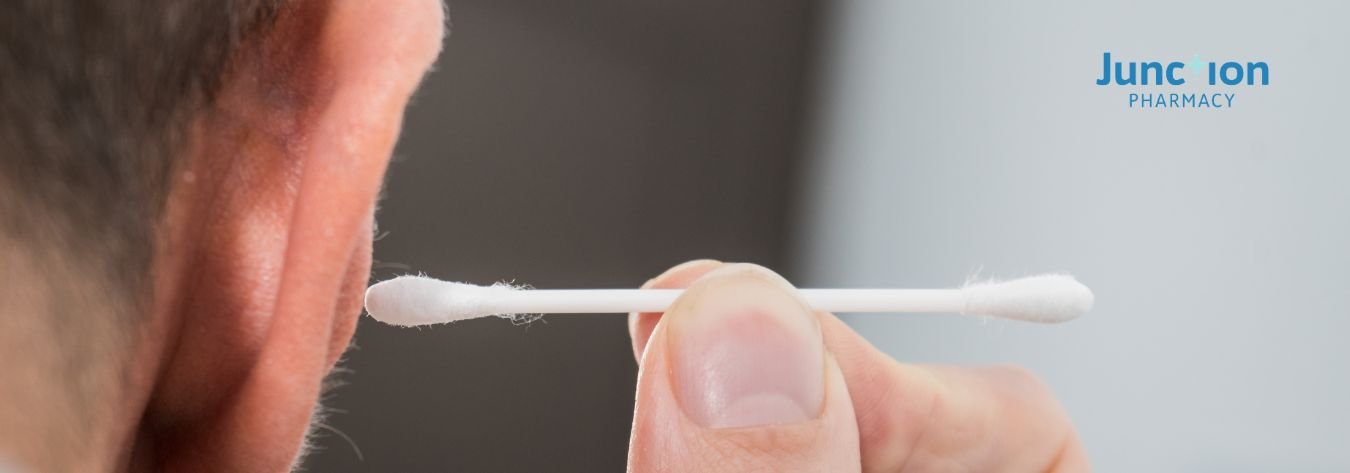 Cotton bud in ear