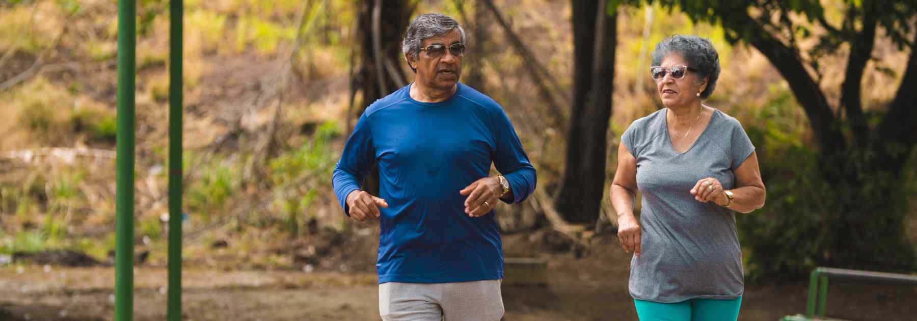 Couple exercising outside to support weight loss