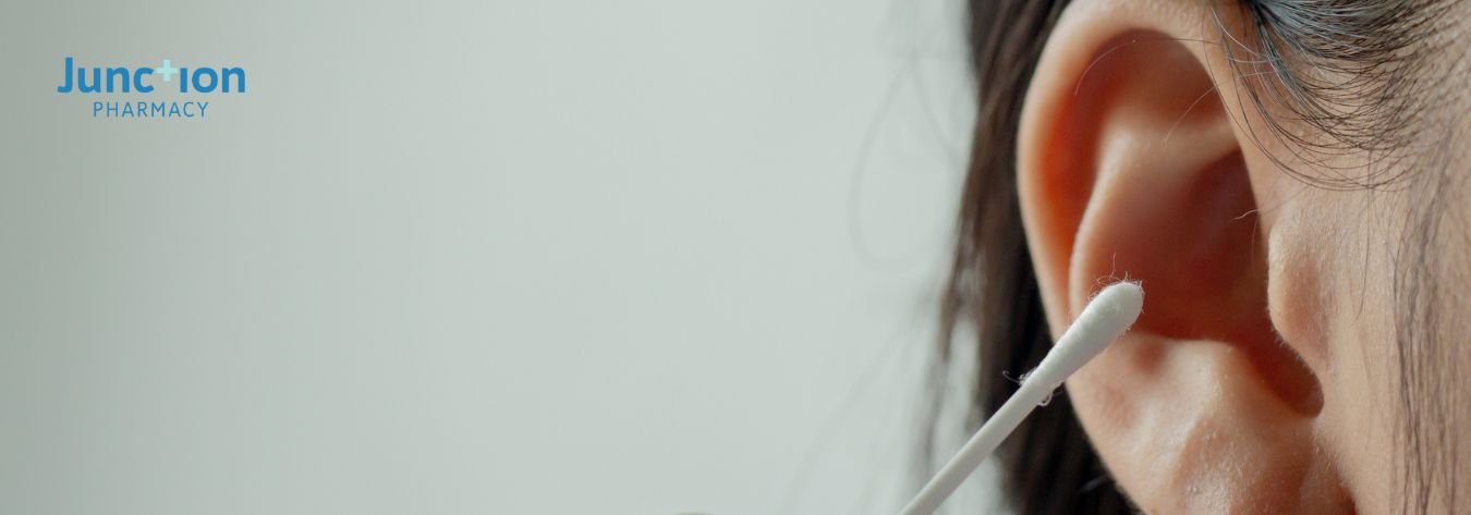 Cotton bud in ear