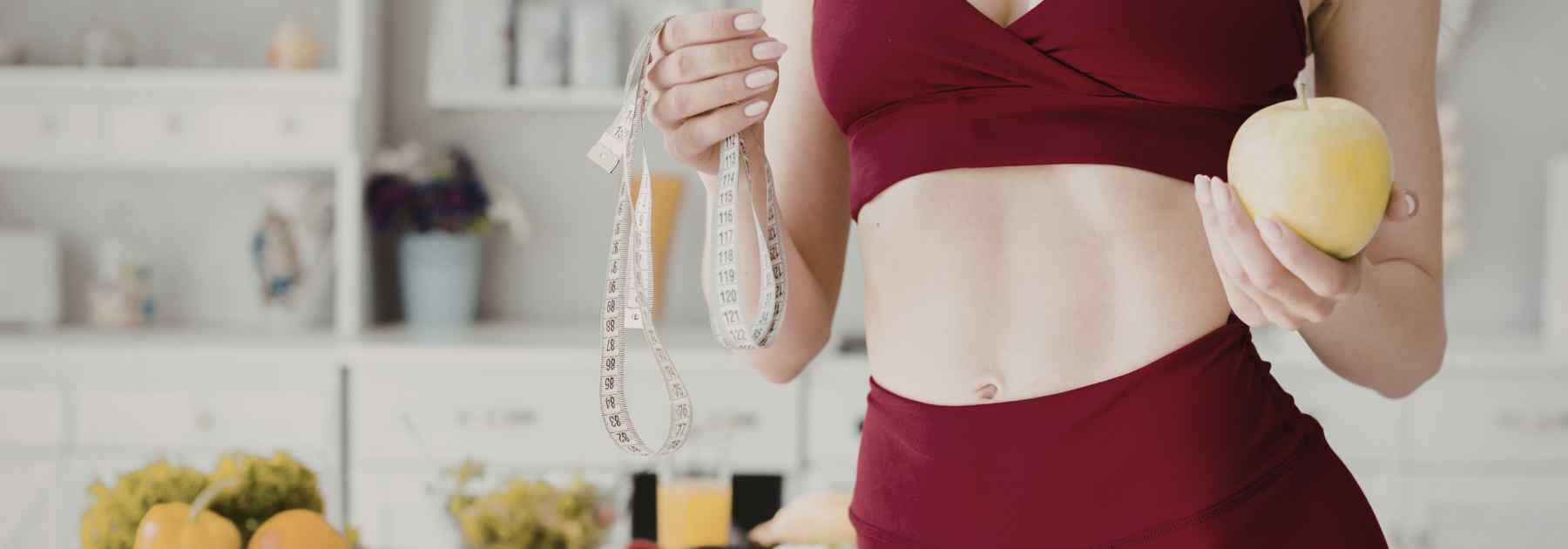 Weight loss success for a woman in gym gear