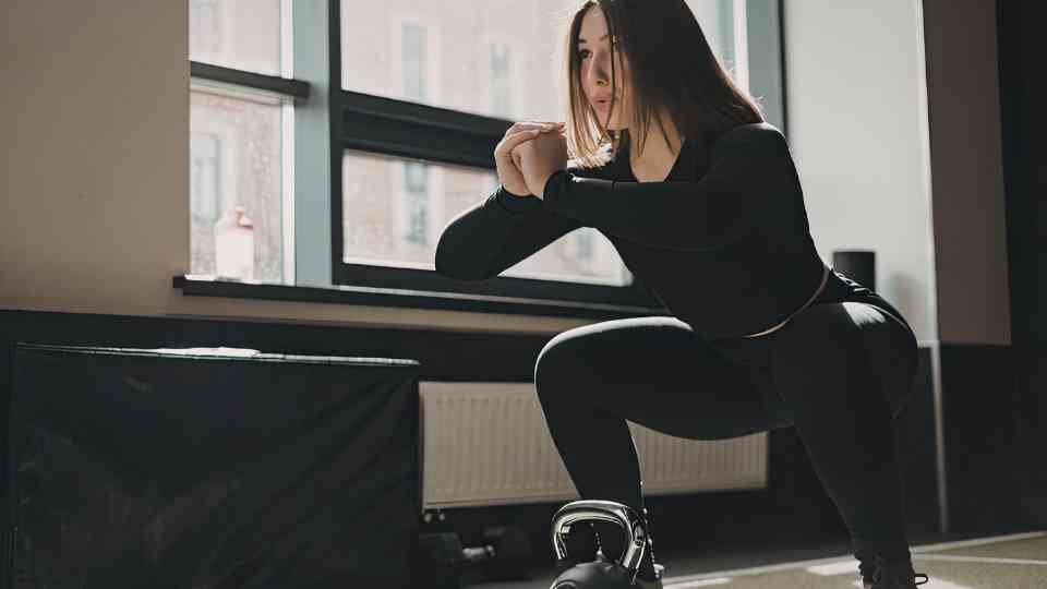 Woman exercising to support weight loss