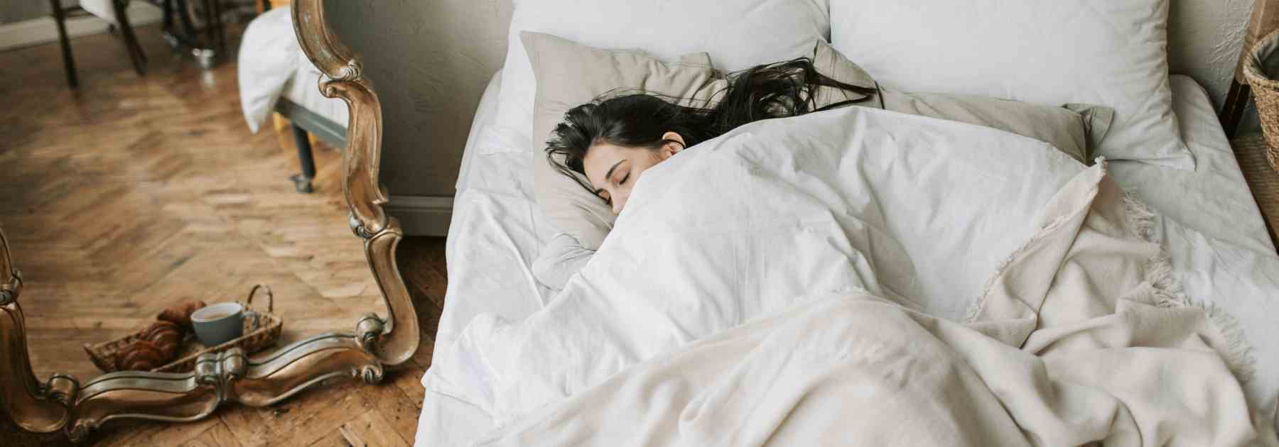 Woman asleep the morning after
